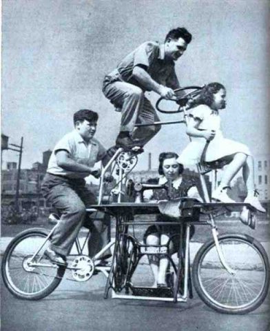 A bicycle that fits a family of four, including a sewing machine. (1939).